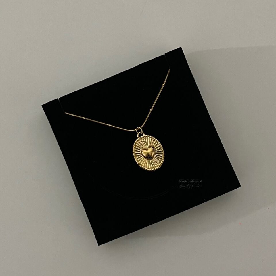 Çelik Bombeli Oval Kalp Kolye